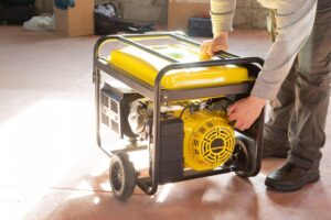 worker holding a generator